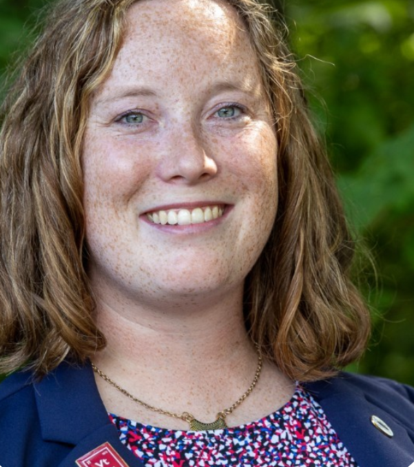 portrait of Alex Hyler in a blue blazer